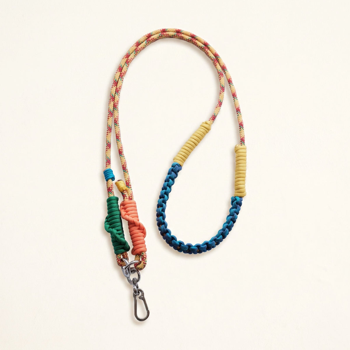 Braided rope phone lanyard and bag strap in Carnival (rainbow & teal), metal swivel and spring clips.