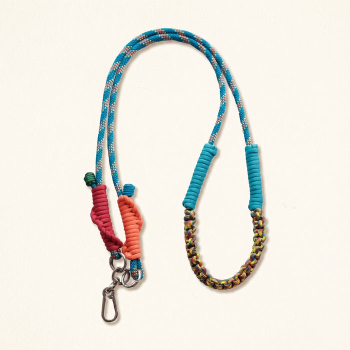 Braided rope phone lanyard and bag strap in Lagoon (teal & coral), metal swivel and spring clips.