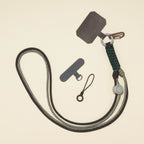 Braided rope phone lanyard in Truffle (brown & khaki), knot-work detail, phone tabs and mini loop.