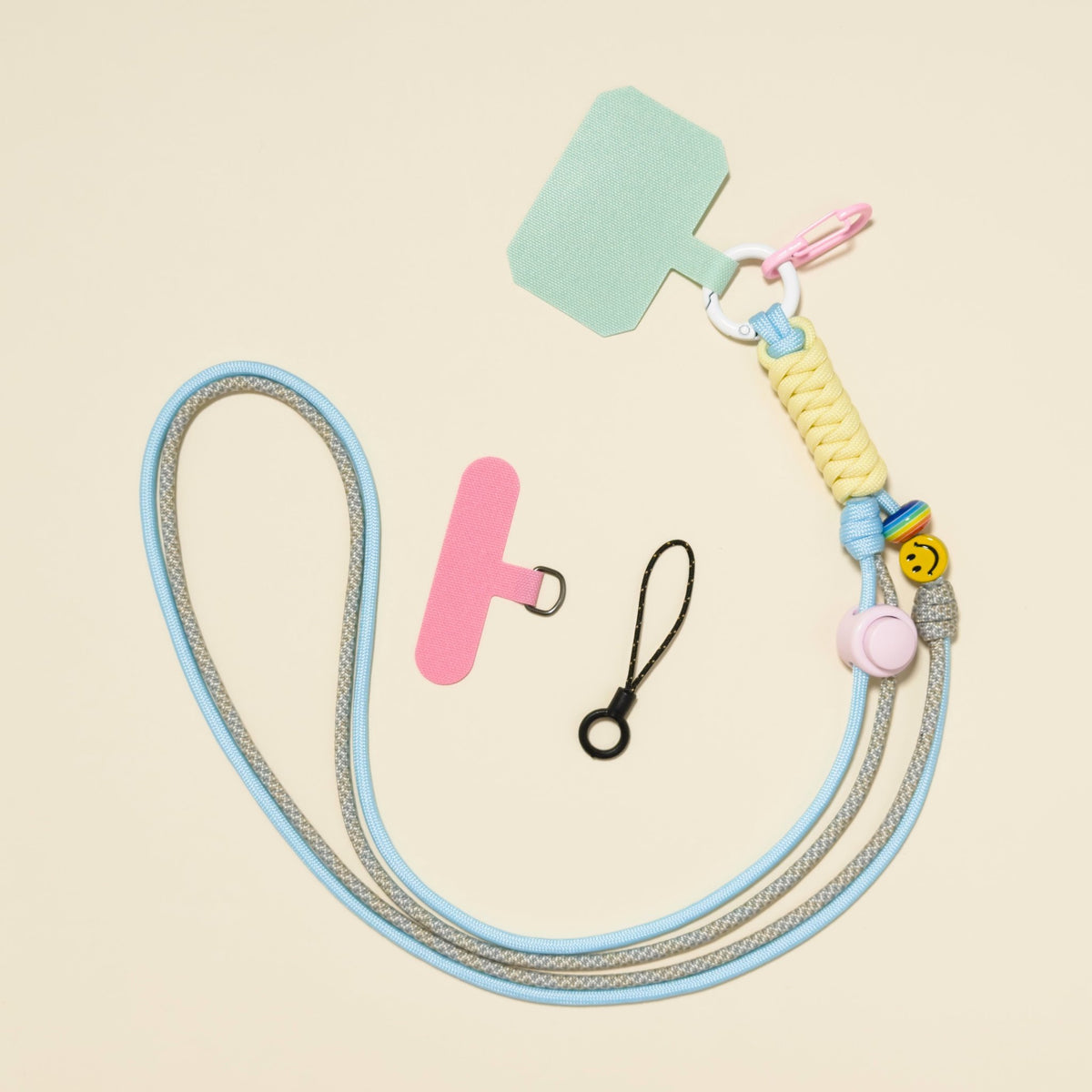 Braided rope phone lanyard in Harbour (blue & grey), with beads, phone tabs and mini loop.