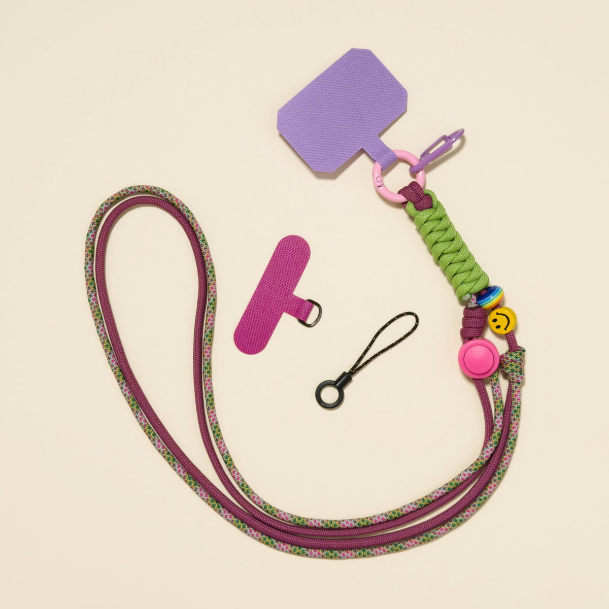 Braided rope phone lanyard in Thistle (mauve & olive), with beads, phone tabs and mini loop.